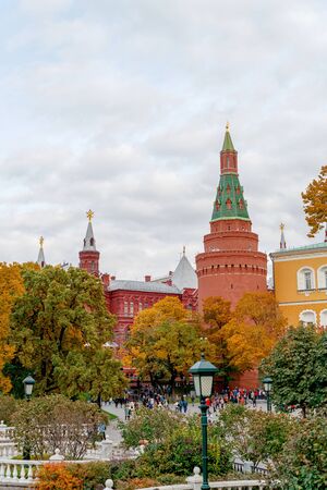 Russia, Moscow October 2019. View of the Moscow Kremlin. People walk in the Alexander Garden near the Kremlin. Famous sights of Moscow and Russia.の写真素材
