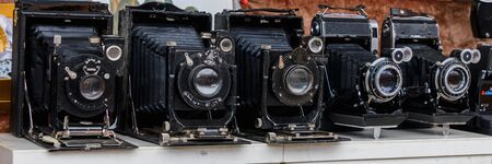 Moscow, Russia, February 2020. Selling vintage cameras at a flea market close-up.