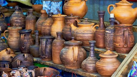 Belarus, Minsk, August 2019. A small street shop selling Souvenirs. A large assortment of handmade pottery.の写真素材