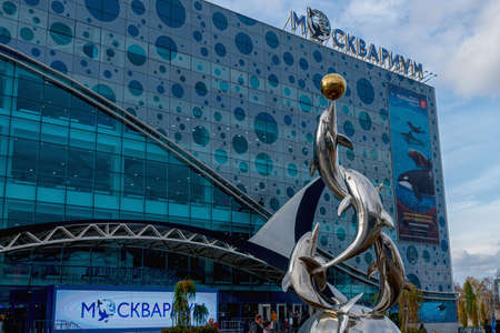 Russia, Moscow, October 2019. Sculpture of Dolphins at the entrance to the aquarium Moskvarium at VDNH.のeditorial素材