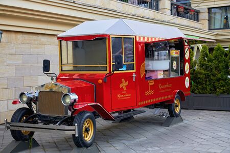 Russia, Kazan, June 2019. Street cafe stylized as an old car. Cafe on wheels in the form of a car.