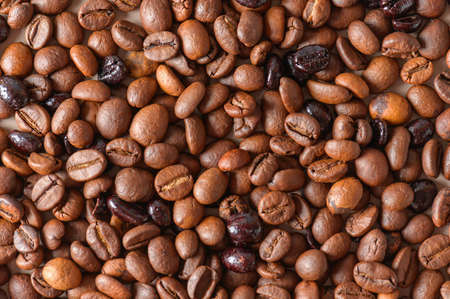 Coffee beans texture high quality background. Roasted coffee beans. Mixture of different kinds of roasted coffee beans background.の写真素材