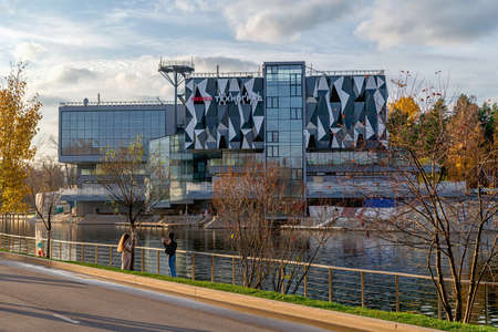 Russia, Moscow, October 2020. Modern building of the fishing industry pavilion on the lake shore at the VDNH exhibition.のeditorial素材