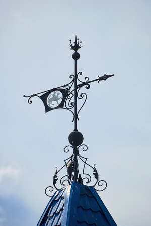 Russia, Kazan June 2019. Weather vane on the building of the hotel for pilgrims in the Raif monastery. Christian culture, tourism and pilgrimage.のeditorial素材