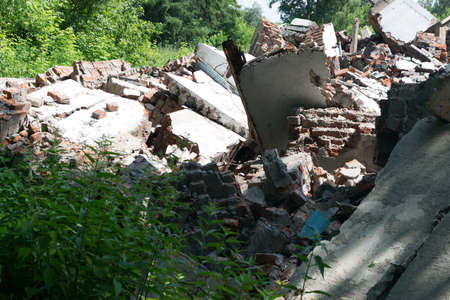 A ruined apartment building as an illustration of an earthquake or war. Abandoned housing in a...
