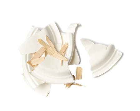 Torn paper plate, broken wooden forks, knives isolated. Eco tableware pieces, disposable cutlery,...
