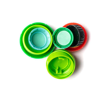 Plastic bottle cap isolated. Recycling hdpe material pile, circle polyethylene lid, colorful caps on...
