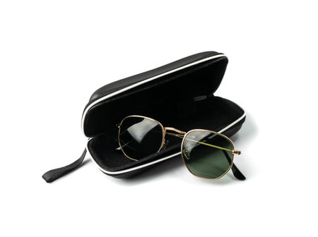 Glasses box isolated. Eyewear case closeup, eyeglasses box with selective focus, macro shot of glasses casing on white backgroundの写真素材