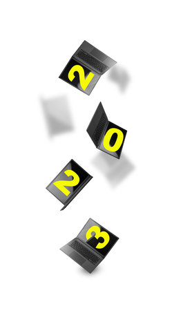 Flying 2023 laptop. Open laptop monitors with 0, 2, 3 numbers on screen, new year notebook pc on white backgroundの写真素材