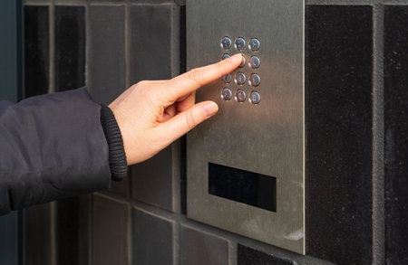 Secure Home System, Hand Pressing on Intercom Keypad, Using Door Phone, Doorphone, Entryphone,...