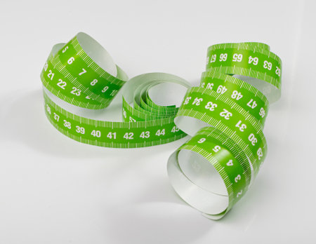 Measuring Tape, Green Measure Tapes, Sewing Metric Tape on White Backgroundの写真素材
