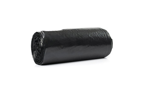 Garbage Bag Roll Isolated. Trash Package, New Rolled Plastic Bin Bags, Black Polyethylene Waste Container on White Backgroundの写真素材