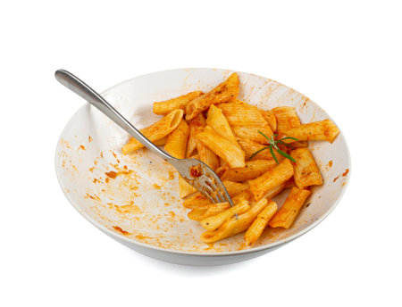 Pasta Leftovers, Unfinished Meal on Dirty Plate, Bowl after Dinner Isolated, Uneaten Lunch Leftover, Macaroni, Smeared Sauce on White Plate Background, Clipping Pathの写真素材