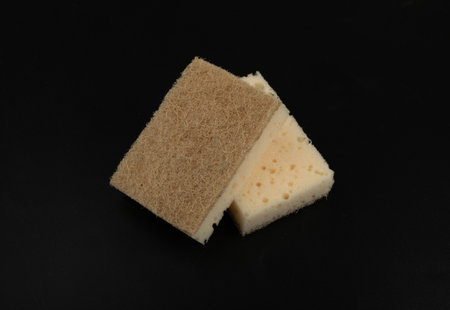 Natural Sponge Isolated on Black, Eco Brown Sponges, Eco Friendly Hygiene Accessory, Scotch Brite Dishwasher on White Backgroundの写真素材