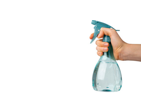 Spray Bottle in Hand Isolated, Blue Sprayer with Water, Flower Spray Gun, Plastic Pulverizer, Spray Bottle on White Background, Clipping Pathの写真素材