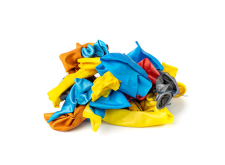 Popped Balloon Isolated, Deflated Ball, Burst Ballon, Latex Rubber Garbage, Popped Balloon on White Backgroundの写真素材