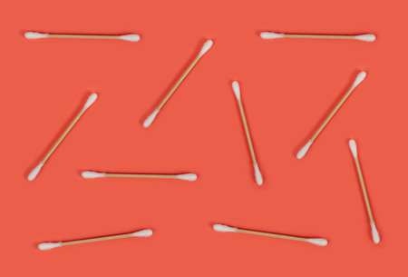 Cotton Swabs Pattern, Eco Natural Paper Ear Sticks Texture Background, Biodegradable Hygiene Buds, Earwax Cleaner Swabs, Ear Sticks on Pink Backgroundの写真素材