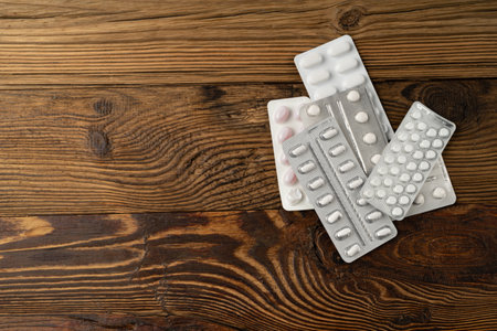 Pill Blister on Wooden Background, Silver Capsule Package Mockup, Drugs Packaging Banner, Pill Pack,...