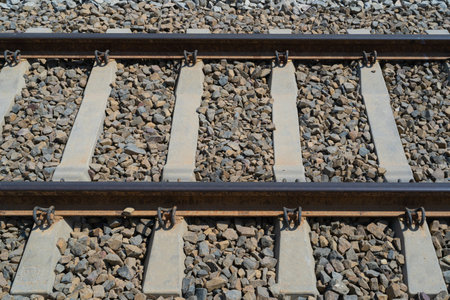Railway Lines Closeup, Train Tracks with Track Ballast Stones, Metal Rails, Old Railway Track on...