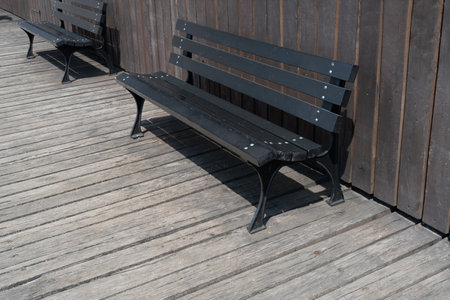New Modern Bench in Park, Outdoor City Architecture, Wooden Benches, Outdoor Chair, Urban Public Furniture, Empty Plank Seat, Comfortable Bench in Recreation Areaの写真素材