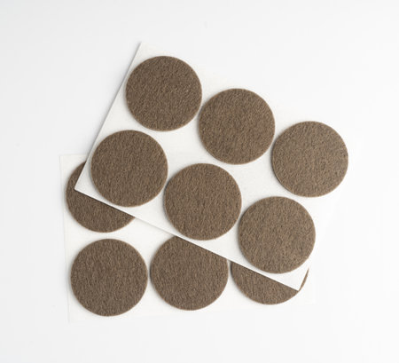 Adhesive Felt Pads Floor Protectors Isolated, Anti-Skid Felt Stickers for Chair Legs, Anti-Noise Coating, Furniture Floor Careの写真素材