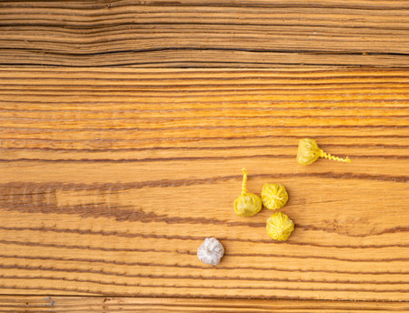 Small Firecrackers, Celebration Dynamite, Kids Pyrotechnics, Fire Cracker on Wood Background with Copy Spaceの写真素材