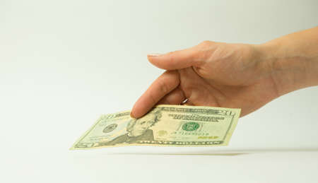 Hand with money isolated on a white background, isolate