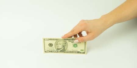 Hand with money isolated on a white background, isolate
