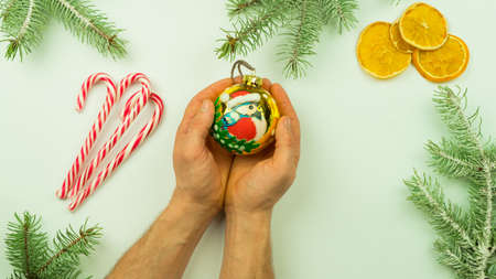 Preparing for Christmas. New Year's crafts, gifts, fir branches, garlands. White background. View...