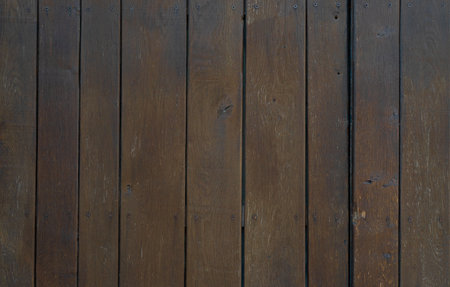 The texture of the old and worn brown wood. Wooden shabby background, blank templateの写真素材