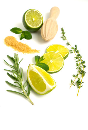 Mojito ingredients. Lime, mint and cane sugar isolated on white background. Sweet sugar, mint leaves and lime. rosemary, thymeの写真素材