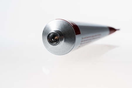 Close up of aluminum tube isolated on white background. Cosmetic or medicine gel.の写真素材