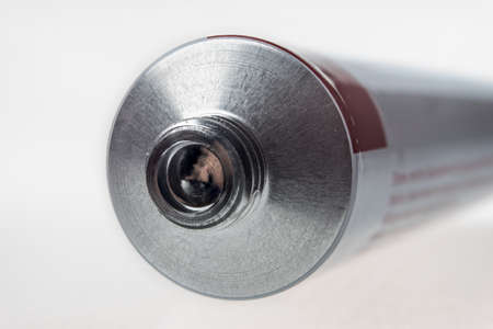 Close up of aluminum tube isolated on white background. Cosmetic or medicine gel.の写真素材