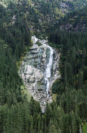 Mountain river and trees landscape natural environment. Hiking in the alps. Grawa Waterfall in Stubai Valley, Tyrol, Austriaの写真素材