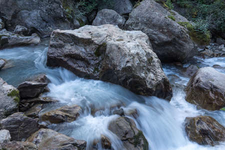 Mountain river and stones landscape natural environment. Hiking in the alps. Grawa Waterfall in Stubai Valley, Tyrol, Austriaの写真素材