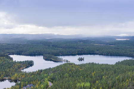 Mountains, forests, lakes view in autumn. Fall colors - ruska time in Konttainen. One part of Karhunkierros Trail. National park in Finland. Lapland, Nordic countries in Europeの写真素材