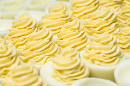 Sliced and filled boiled egg. Concept of food and organic farm products.の写真素材