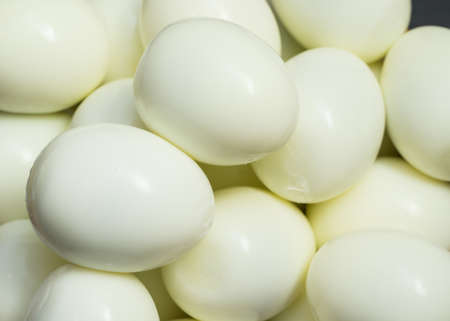 Bunch of boiled and peeled eggs. Concept of food and organic farm products.