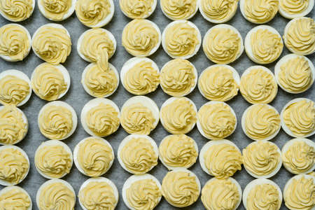 Sliced and filled boiled egg. Concept of food and organic farm products.
