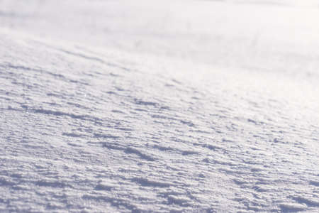 White snow and blue shadows, natural background