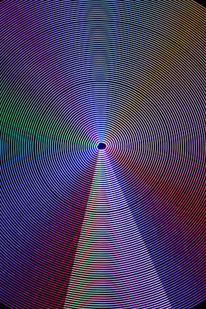 Multi color abstract light painting. LED lights on black background
