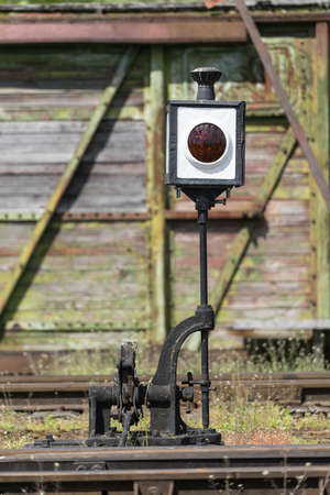 Railroad tracks stretches and green grass and trees. Railway road environment background.End of the rail.の写真素材