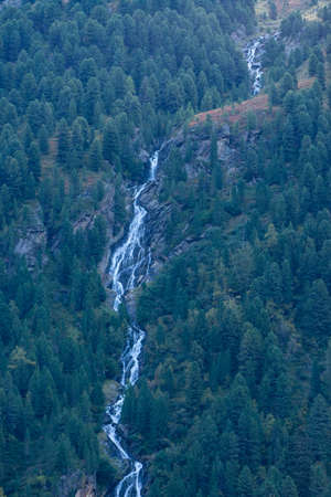 Mountain river and trees landscape. Kaunertaler Gletscher natural environment. Hiking in the alps,...