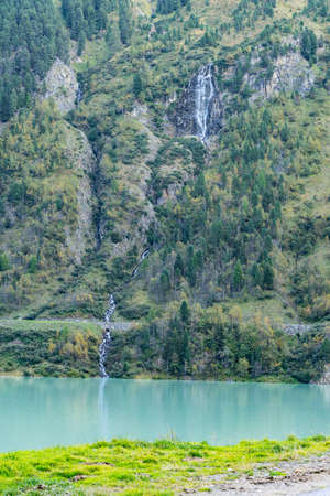 Mountain river and trees landscape. Kaunertaler Gletscher natural environment. Hiking in the alps, Kaunertal, Tirol, Austria, Europe.の写真素材