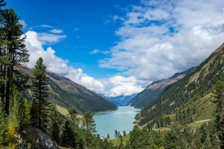 Mountains, peaks, lake, everlasting ice and trees landscape. Kaunertaler Gletscher natural environment. Hiking in the alps, Kaunertal, Tirol, Austria, Europeの写真素材