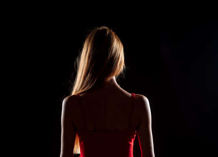 Caucasian white female model portrait. Beautiful girl, long blonde hair. Woman posing studio shot on...