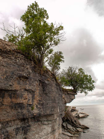 Stone wall on the Baltic sea in the summer. Pakri coast, island in Estonia, Europe.の写真素材