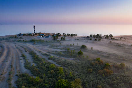 Lighthouse and hause on the small island in the Baltic Sea. Architecture on the Osmussaar, Estonia, Europe.の写真素材