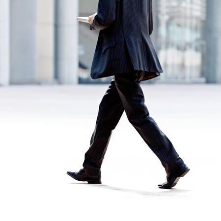 Businessman on the background of the office  The modern businessman の写真素材