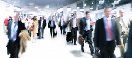 A large group of arriving businessmen. Panorama. Motin blur.の写真素材